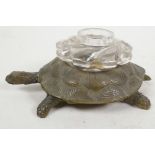 A bronze and glass inkwell cast in the form of a tortoise, 4½" long