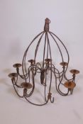 A wrought iron nine branch chandelier, 26½" drop