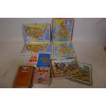 A quantity of wood jigsaw puzzles