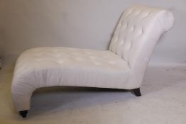 A contemporary button back linen chaise longue, 52" x 28"