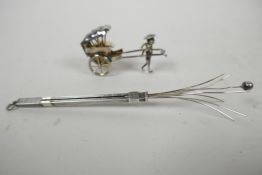 A sterling silver retractable swizzle stick, hallmarked Birmingham, 6.6 grams, and a Chinese