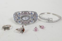 A small collection of costume jewellery including two rings, a cubic zirconium bangle etc