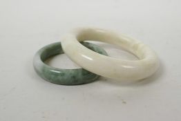 A Chinese hardstone bangle and another similar, largest 4"
