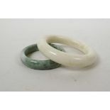 A Chinese hardstone bangle and another similar, largest 4"