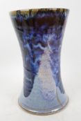 A studio pottery vase with dark over pale blue drip glaze, impressed mark to base, 9¼" high