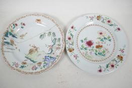 Two C18th Chinese porcelain plates, one painted with flowers, the other with a boy on a buffalo,