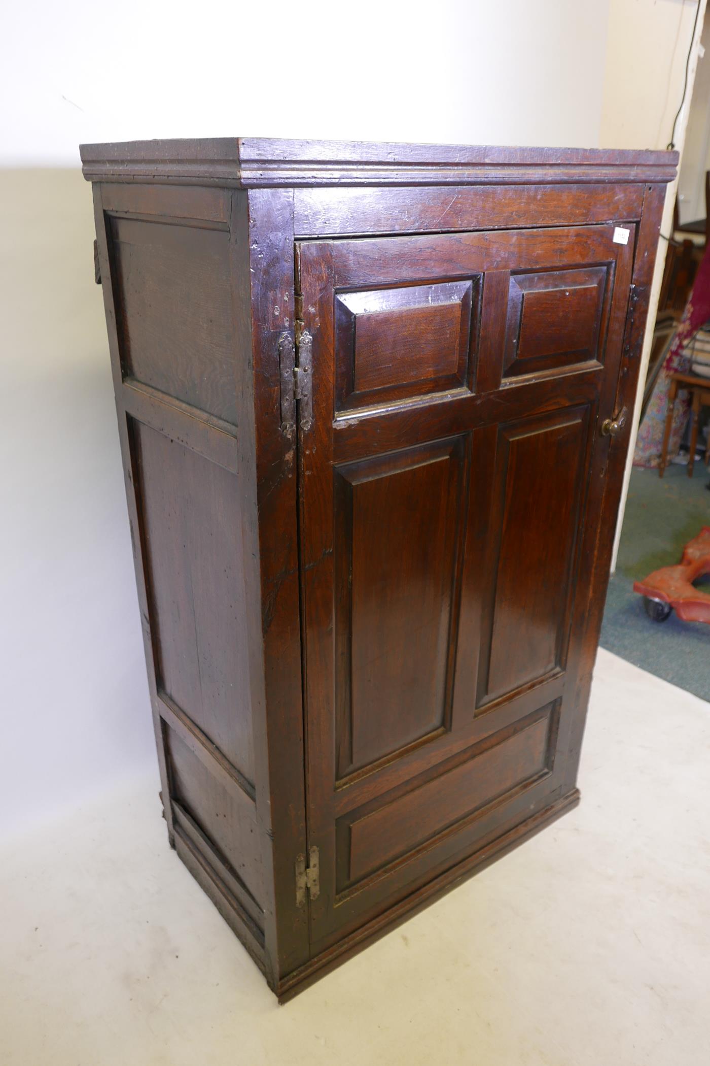 An C18th oak cupboard, with fielded panel door, 33" x 19" x 55" - Image 3 of 3