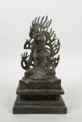 A Tibetan bronze of a sword wielding wrathful deity, 8" high