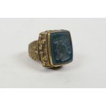 An Ottoman style brass intaglio ring