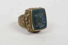 An Ottoman style brass intaglio ring