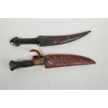 An Ottoman jambiya with leather sheath, the curved blade 6" long, together with an Ottoman dagger