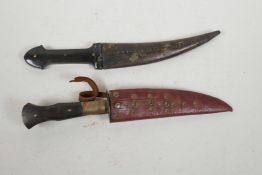 An Ottoman jambiya with leather sheath, the curved blade 6" long, together with an Ottoman dagger