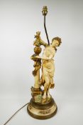 A painted spelter lamp in the form of a classical maiden, 30" high