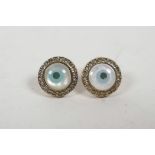 A pair of 925 silver and gilt metal all seeing eye ear studs, set with cubic zirconia
