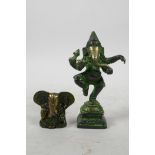 Two Indian brass figures of Ganesh with applied green patina, largest 4½" high