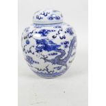A Chinese blue and white ginger jar and cover decorated with dragons chasing the flaming pearl, 4