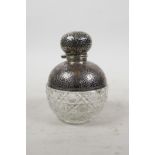 A dimpled, silver topped moulded glass scent bottle, Chester 1908, 4½" high