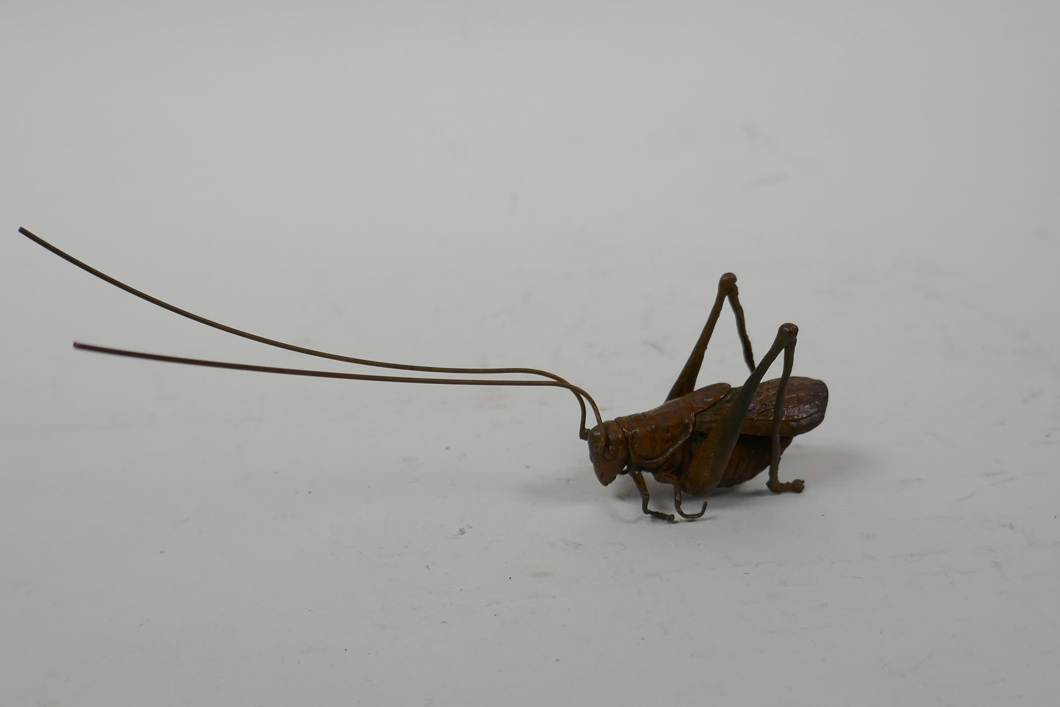 A Japanese Jizai style coppered metal cricket, 5" long