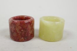 A Chinese hardstone archer's thumb ring, and another similar