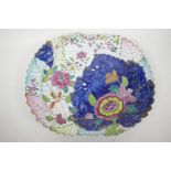 A C19th Chinese Imari charger decorated with flowers and shaped rim, 17" x 14", A/F, pinned
