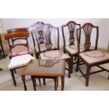 A set of four C19th mahogany pierced splat back dining chairs, a pair of side chairs and a nest of