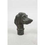 A bronze walking stick handle in the form of a dog, 3"
