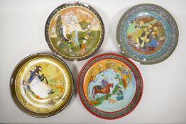Four Indo-Persian painted terracotta plates depicting men drinking, a family in a garden, and