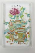 A Chinese famille rose porcelain tray decorated with objects of virtu, 7½" x 11"