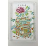 A Chinese famille rose porcelain tray decorated with objects of virtu, 7½" x 11"