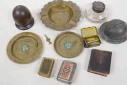 A collection of curios; mauchlin ware domed box, novelty fireman's helmet, inkwell, heavy clear