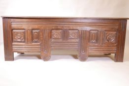 A C18th French oak dower chest with carved decoration, 69" x 20½", 25" high