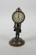 A bronze desk clock in the form of a winged cherub holding aloft a pocket watch, 4½" high