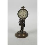A bronze desk clock in the form of a winged cherub holding aloft a pocket watch, 4½" high
