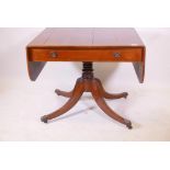 A Regency rosewood single drawer sofa table with satinwood banded top and boxwood stringing,