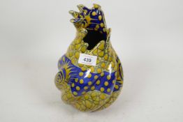 A crackle glazed Greek vase with blue and yellow decoration, 9½" high