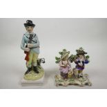 A C19th Staffordshire porcelain figure of a hunter with a gun and dog at his feet, 7" high x 3"