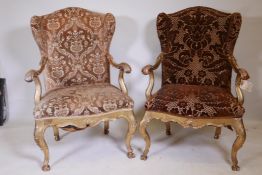 A C18th carved giltwood open armchair with a wing back, scroll arms and shaped rails, raised on