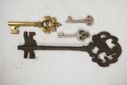 Four mixed metal keys, longest 11"