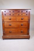 A Dutch mahogany chest on chest, the upper section with six over two drawers, the base with two long