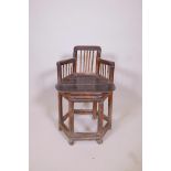 A late C19th/early C20th Chinese bamboo corner chair with a spindle back, 28" high