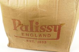 A Palissy 'Game Pattern' 36 piece pottery dinner and tea service, still in box, in original straw