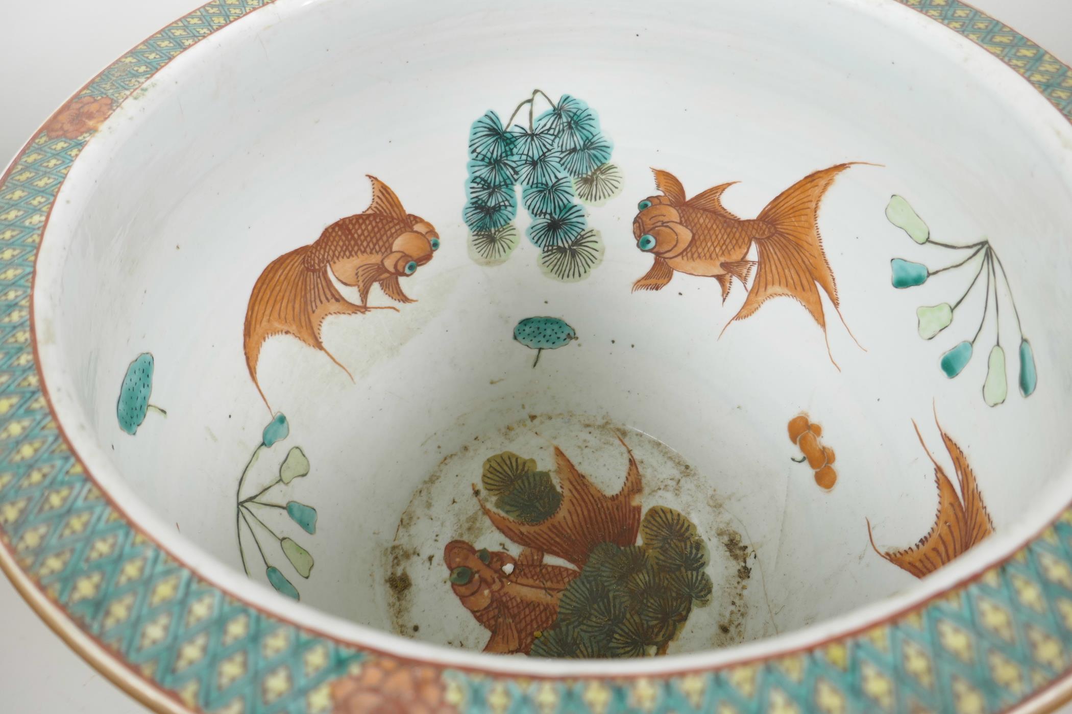 A large Chinese ceramic fish bowl, the interior decorated in bright enamels with carp, the outer - Image 4 of 4