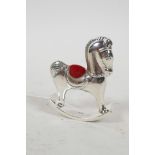 A novelty 925 silver pincushion in the form of a rocking horse, 2½" high