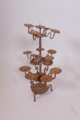 A wrought iron fifteen branch pricket candlestick, 24" high