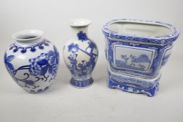 A Chinese blue and white porcelain oval jardiniere on stand, 9" high, together with two blue and
