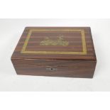 A C19th writing box with faux rosewood graining, the lid decorated with a Roman chariot, fitted
