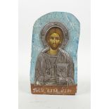 An Orthodox icon with a white metal mount, 6" high