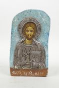 An Orthodox icon with a white metal mount, 6" high