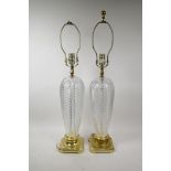 A pair of French glass and brass table lamps, 29" high