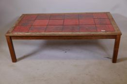 A 1970s rosewood and tile top Danish coffee table, one tile A/F, 52½" x 29", 16½" high